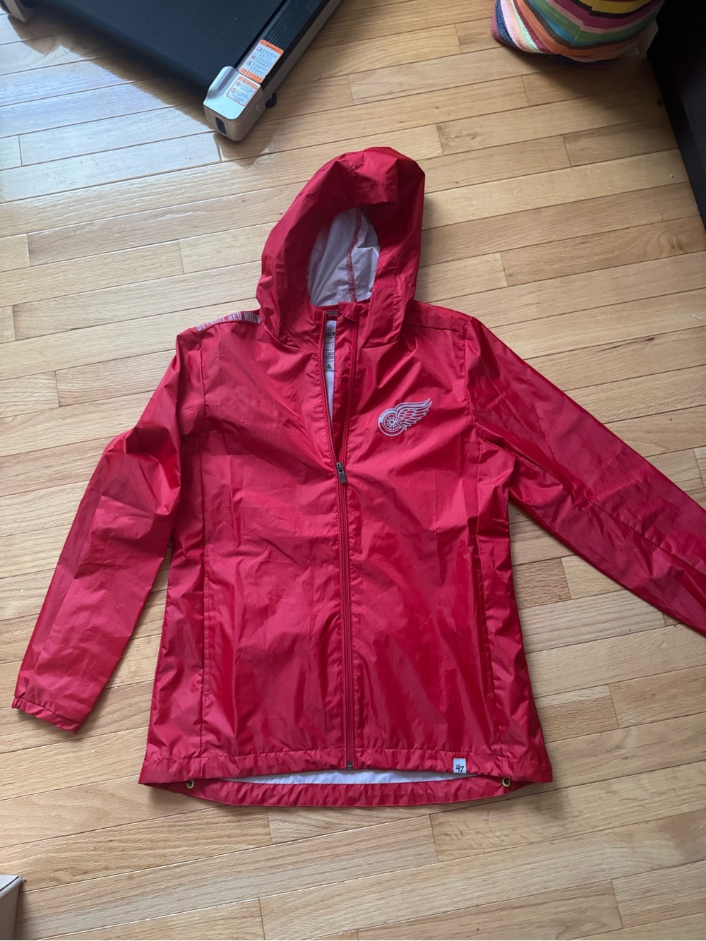 DETROIT RED WINGS Women's Rain Jacket with Team Emblem
